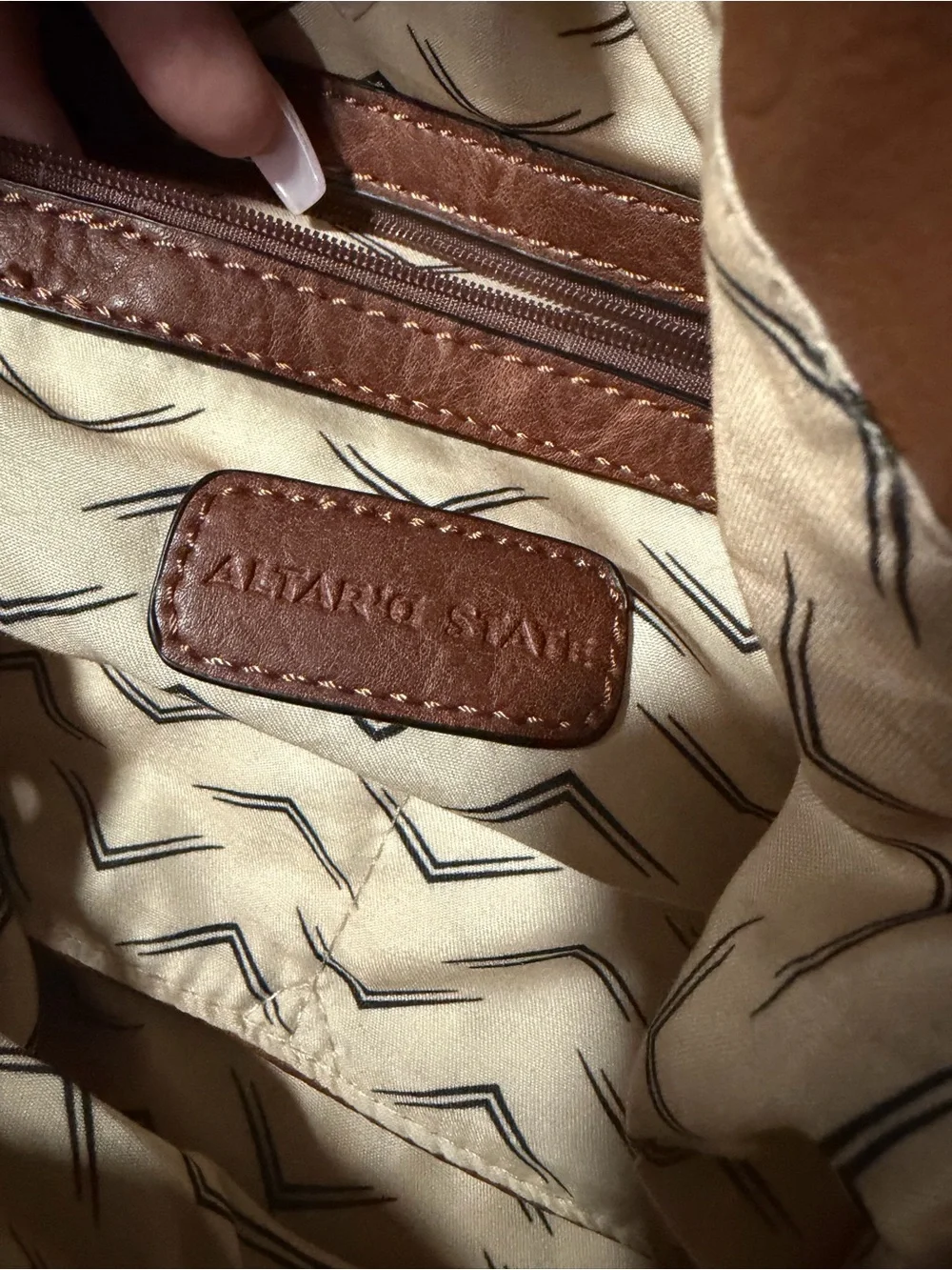 Altar'd State Woven Leather Tassel Backpack in Brown